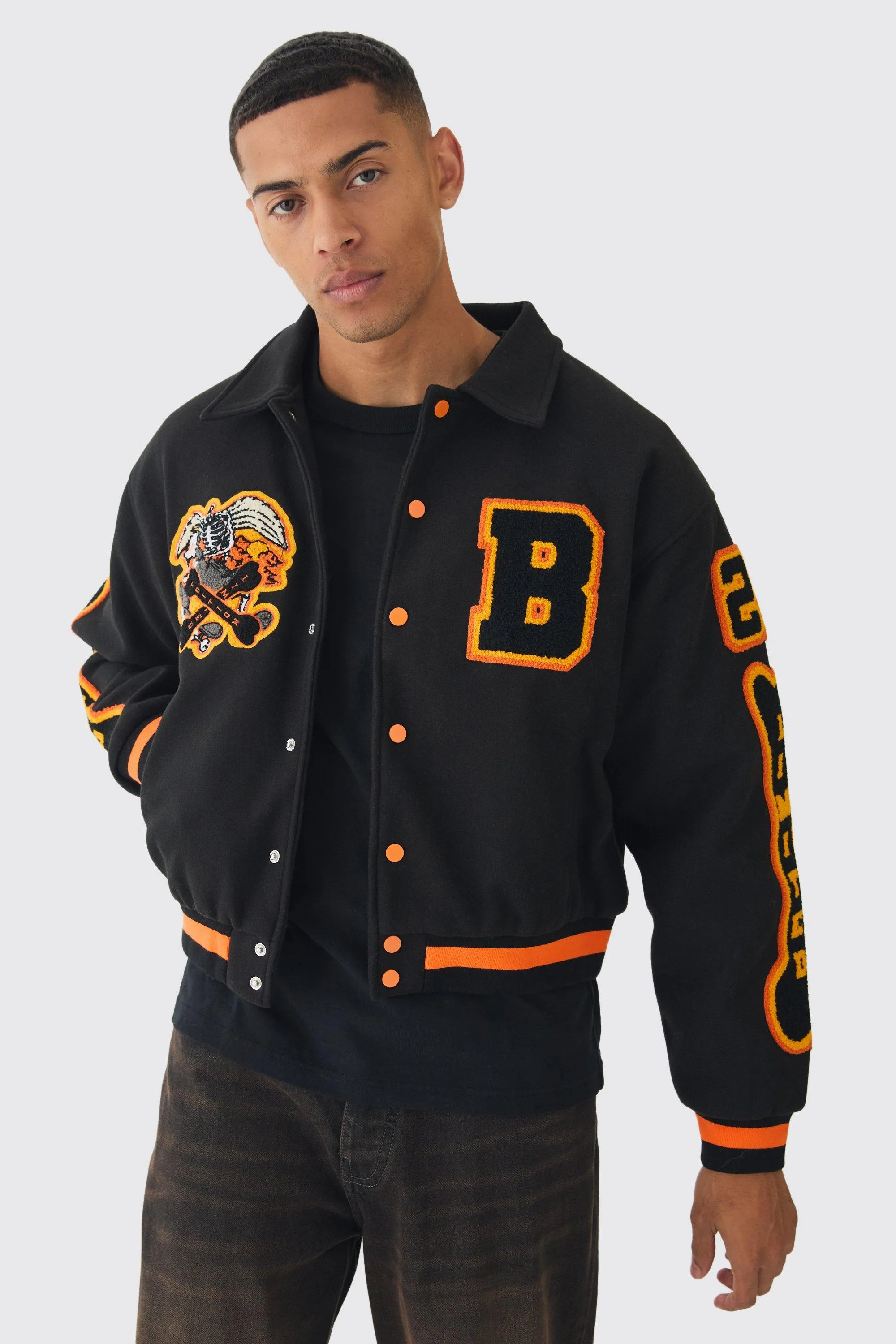 Boxy Badge Collared Varsity Jacket In Black