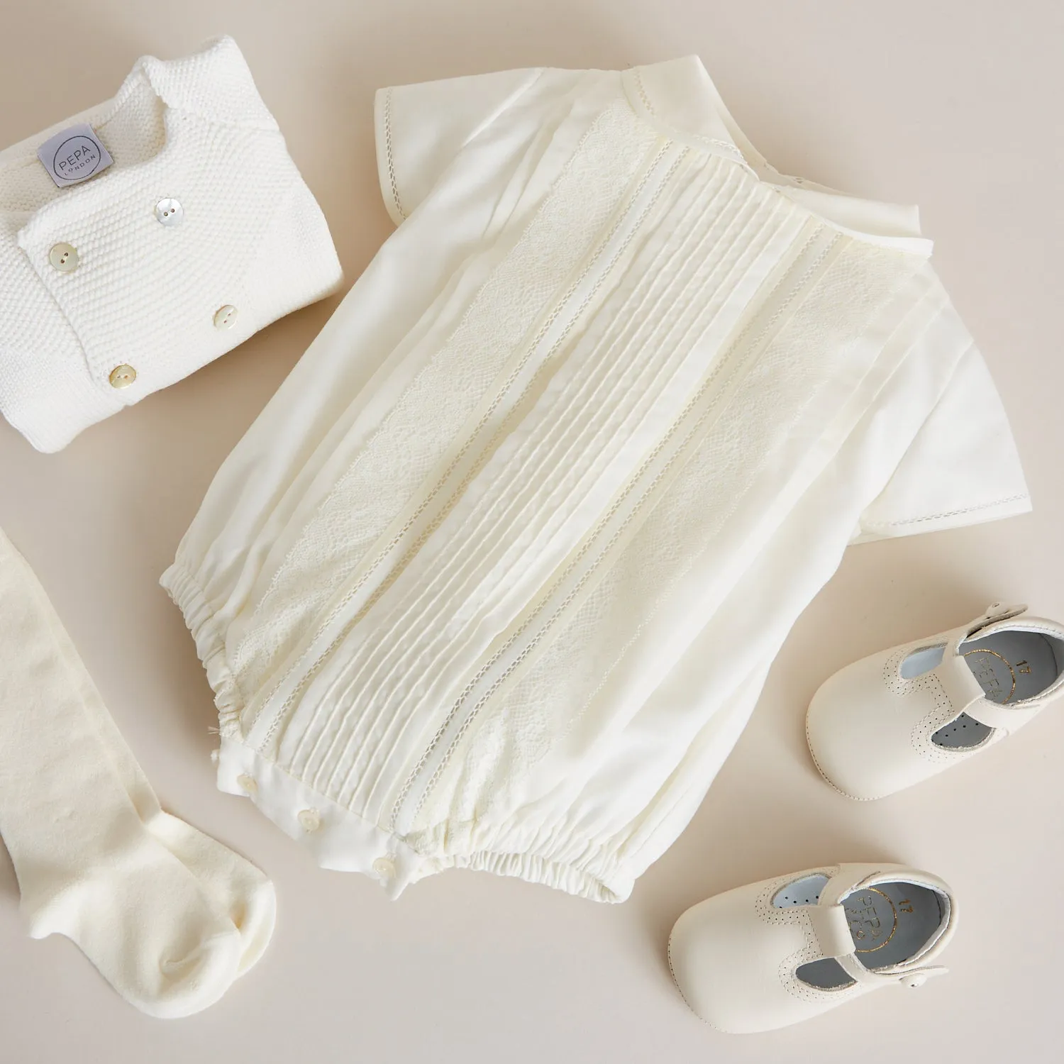 Ivory Panelled Christening Romper (3-12mths)